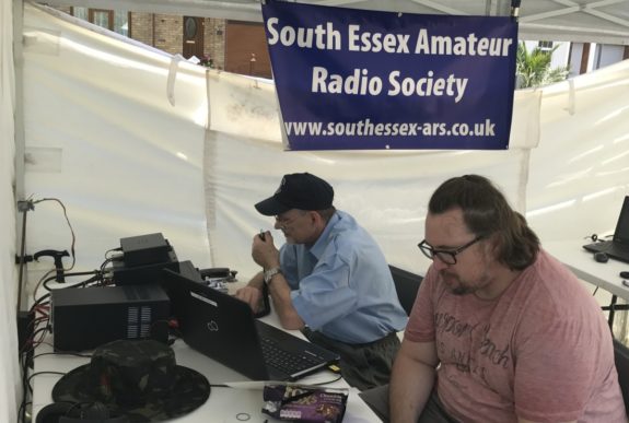 Dave G4AJY operating HF voice (rare sight!) with Henry watching