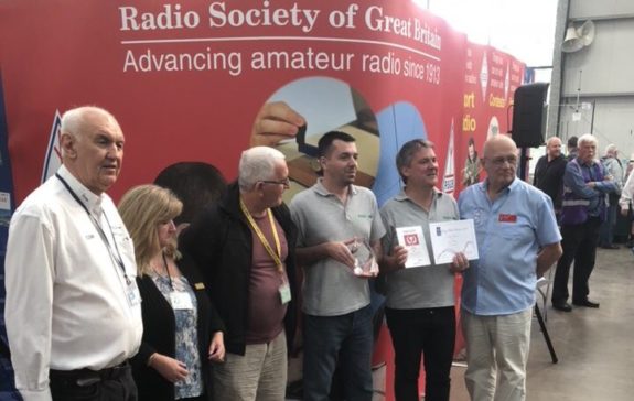 Members accepting the award on behalf of Essex Ham, from Peter Waters and RSGB President Dave Wilson