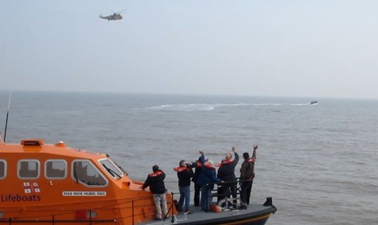 Radio Caroline Team waving to the RAF Seaking Helicopter